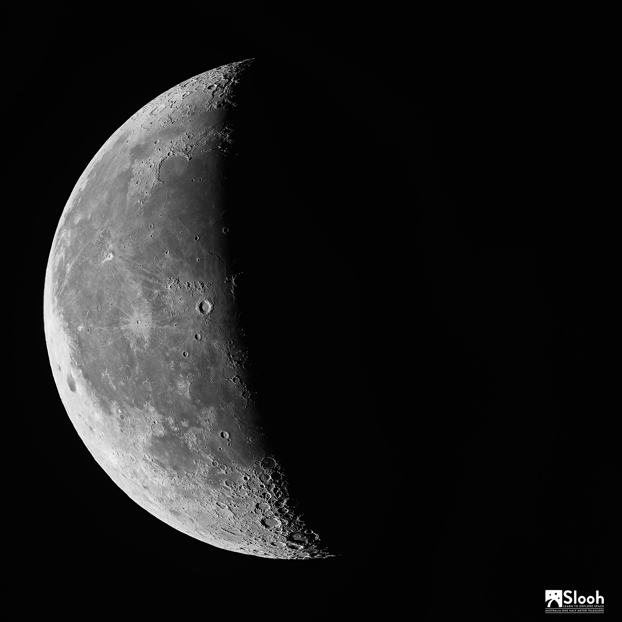 Detailed monochrome astrophotograph of the Moon against a black sky